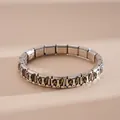 Macro view of modular stainless steel bracelet links with a cute dog enamel charm - Stainless Steel Border Collie Bracelet (Style 6)