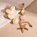 Marine style acrylic beaded bracelet featuring starfish and shell charms in cream and gold - Starfish Pendant Beaded Bracelet