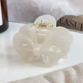 Elegant cream white acetate bow hair claw clip with pearlescent finish and gold spring - 6cm / Mermaid White