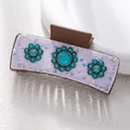 Detail of bohemian claw clip with turquoise flowers and purple sequins over brown matte finish - Purple Sequin Three Turquoise Flower Style (F731-24)