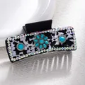 Detail of cow print hair claw with turquoise stone and sparkling rhinestones - Cow Print Turquoise Flower Gem Style (F731-22)