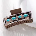 Detail of leopard print hair claw clip featuring turquoise stones and crystal borders - Leopard Four Turquoise Beads Style (F731-21)