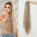 Extra long 36-inch water wave ponytail extension in light blonde with subtle highlights - Cool Gold Long