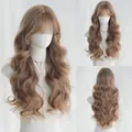 Long wavy light brown wig with bangs shown on mannequin from three different angles - Pink Gold / 75cm