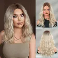 Long wavy ombre wig with center part from dark brown roots to blonde shades - Ombre Blonde