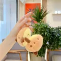 Close-up of cute plush avocado keychain with embroidery details and silver metal ring - Sweet Potato (With Silver Chain)