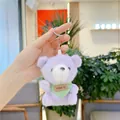 Detail of purple plush bear keychain with green polka dot scarf and silver ring - Hanging Chain / Purple