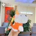 Close-up of West Highland white terrier plush toy with orange sweater and yellow hat - Orange Clothes / 12cm