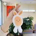 Close-up of a plush white bunny keychain being held, featuring soft fabric and metal ring - Plain Chain / Brown