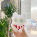 Detailed close-up of a white plush cat keychain with blue and yellow eyes and red scarf - Approx. 12cm / White / Red Scarf / Chain