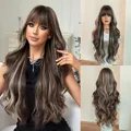 30-inch long wavy brunette wig with blonde highlights and flat bangs on model - Brown Highlight
