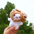 Portachiavi gatto in peluche con cappello taiyaki marrone tenuto in mano all'aperto - Stile Gatto Taiyaki (Chiusura in Metallo Dorato)
