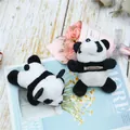 Detail showing plush panda brooches with secure metal pins on a rustic wooden table - Ordinary Style (Long Pin)