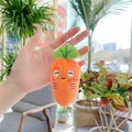 Close-up of a cute plush carrot keychain with embroidered expression and metal bead chain - Carrot / Hanging Chain