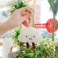 Close-up of cute plush white cloud charm with black eyes and golden keychain - Gold Clasp / White