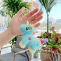 Close-up of a blue plush unicorn keychain held in hand, showing soft texture and rainbow hair - Plain Chain / Green / 12cm x 9cm