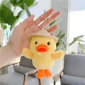 Close-up of yellow plush duck keychain with a mini straw hat and silver metal ring - 12cm / Duck with Silver Chain
