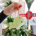 Cute green plush dolphin keychain with pink flower and golden metal buckle for bags - 12cm / Gold Lobster Clasp / Green