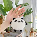 Cute round panda plush keychain with soft faux fur and gold metal clasp in hand - Squinting Eyes Style (Gold Buckle)