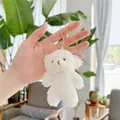 Cute white teddy bear plush keychain with silver ring held in a cozy indoor setting - White Bear / Plain Chain