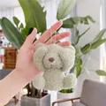 Close-up of mint green teddy bear plush charm with silver chain and curly faux fur - About 11cm / Plain Chain / Green