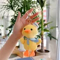 Cute yellow plush duck keychain with sailor hat and striped scarf handheld in sunlit room - Gold Clasp / Yellow / 14cm