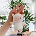 Close-up of cute white sheep plush keychain with pink details and gold metal clasp - White Gold Buckle