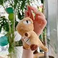 Close-up of a small plush dinosaur keychain in brown with soft fabric and silver bead chain - Light Brown (Silver Bead Chain) / 11cm