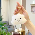 Cute white plush cloud keychain with smiling face and striped legs on a lobster clasp - Striped Legs Gold Keychain / White