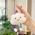 Close-up of white plush cloud keychain with embroidered smile and striped long legs - Striped Legs Ball Chain Pendant / White