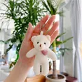 White teddy bear keychain with pink knitted heart and bead chain held in hand - 10.5cm / Pink Heart Decoration / Off White