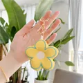 Plush yellow flower keychain with blue edges and golden metal lobster clasp - Yellow - Gold Hook