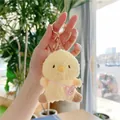 Detailed view of yellow plush chick pendant with pink bag and golden metal keychain - Yellow Chicken Style-Gold Clasp / Yellow