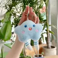 Detalle de colgante de peluche estrella azul claro con bordado y llavero plateado - 12cm / Cadena Simple / Azul
