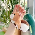 Detail of plush squirrel keychain with soft fur, brown tail and silver metal bead chain - 13cm