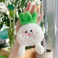 Close-up of cute plush cabbage keychain with soft white fur and green leaves details - Gold Clasp / White