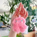 Dettaglio del portachiavi mostro in peluche rosa con chiusura in metallo dorato - Con Cappello (Fibbia Dorata) / Rosa