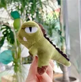 Close-up of a mini bean green dinosaur plush keychain held by hand in a soft lighting - Dark Green (No Chain) / 11cm