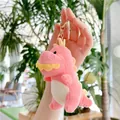Dettaglio del portachiavi a forma di drago in peluche rosa con chiusura in metallo oro - Rosa / Chiusura Dorata