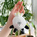 Cute white plush keychain with green leaf top held in hand for bag decoration - Small Mouth Garlic / Hanging Chain