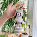 Cute plush raccoon keychain with striped tail and rose gold metal clip for bags - Gold Clasp / Gray