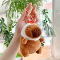 Handheld Capybara plush keychain wearing a white chicken hat with metal lobster clasp - Chicken Hat Style (Gold Clasp)