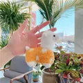 Leuke pluche alpaca sleutelhanger met oranje stippenpatroon en zilveren ring - Eenvoudige Ketting / Geel / 11cm
