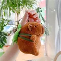 Detailed plush texture of Capybara charm featuring a green turtle shell and silver chain - Turtle Backpack Style (Silver Chain)