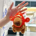 Cute brown plush capybara keychain with traditional red festive hat and gold keyring - Lucky Hat Style (Gold Clasp)