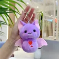 Close-up of purple plush bat keychain with pink wings and red heart embroidery detail - Purple (Ball Chain)
