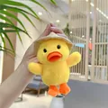 Macro shot of a yellow plush duck keychain with a straw hat and metal bead chain - Duck With Chain / Yellow / 12cm