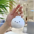 Close-up of cute plush bun keychain with embroidered smiley face and golden metal clasp - Bun (Gold Clasp)