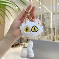 Macro view of white plush cat keychain with embroidered eyes and golden metal clip - White / Gold D-Ring Buckle