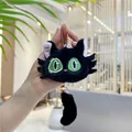 Close-up of black plush cat keychain with green embroidered eyes and metal ball chain - Black / Metal Bead Chain